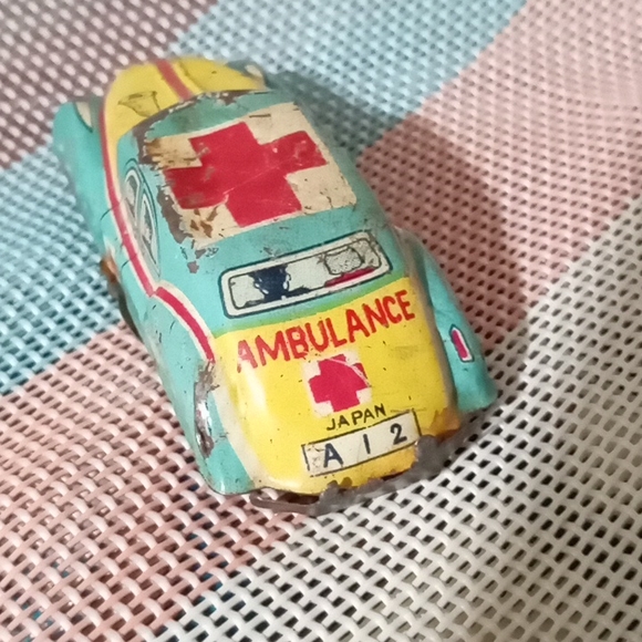 Antique tin toy car and clicker  rare hard to find. Collector's item. - Picture 2 of 9